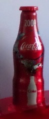 2000 € 3,00 coca cola mini alu flesje ( incl. sleutelhanger)